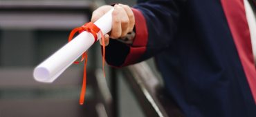 Photo by Gül Işık: https://www.pexels.com/photo/person-holding-white-scroll-2292837/