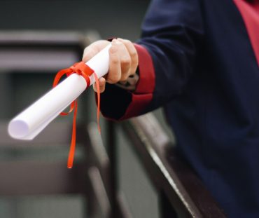Photo by Gül Işık: https://www.pexels.com/photo/person-holding-white-scroll-2292837/